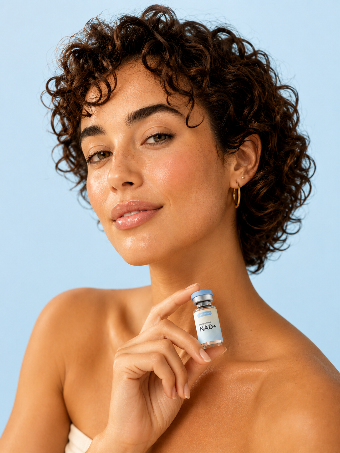 Lifestyle shot with compounded NAD+ vial